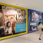 Wandplakate zur Imagekampagne an der Wand einer Unterführung